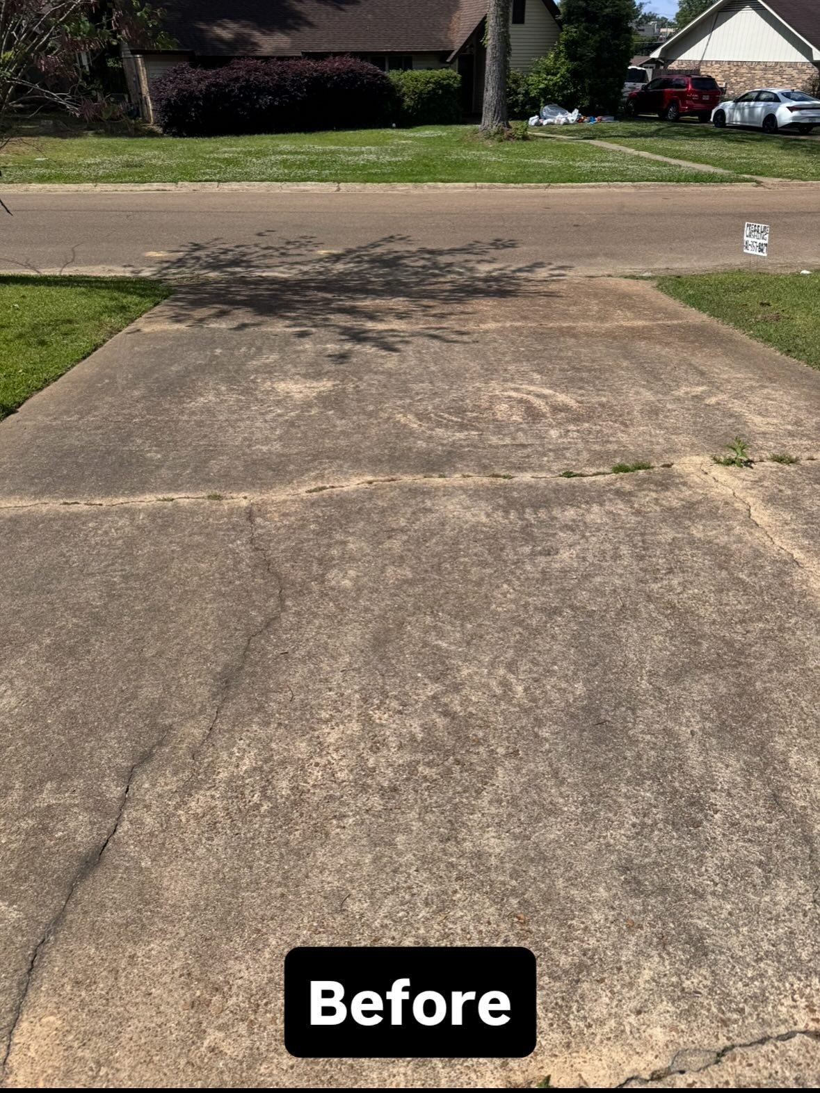 Driveway before pressure washing